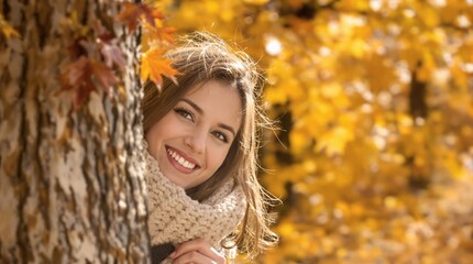 Smiling woman enjoys autumn colors while hiding behind a tree in a scenic park setting