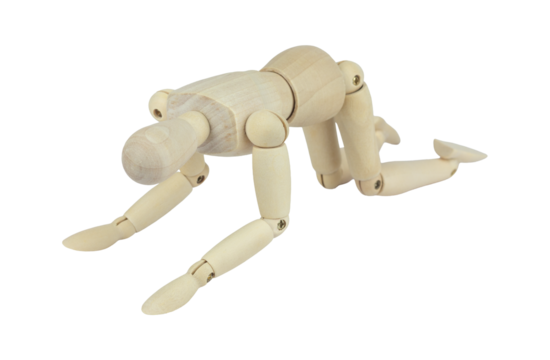 wooden man, wooden mannequin, crawling on all fours, isolated from background, concept of difficulties and pain