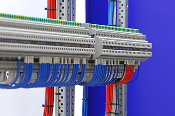 Electrical terminals with connected insulated copper wires with metal lugs. Marking with a thermal...