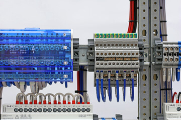 Electrical terminals with connected insulated copper wires with metal lugs. Marking with a thermal...