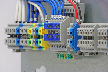 Electrical terminals with connected insulated copper wires with metal lugs. Marking with a thermal...