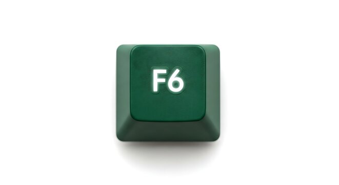 Close-up of a green F6 key from a computer keyboard