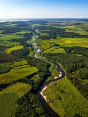 Naklejka premium Aerial view of meandering river through lush green fields nature landscape scenic environment vibrant colors
