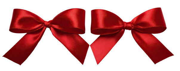Two vibrant red satin bows against a black background