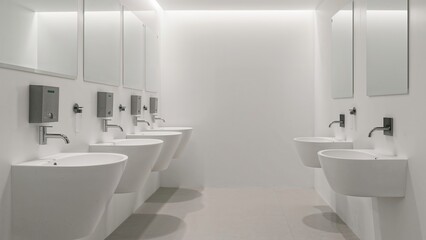 Fototapeta premium Public Lavatory Equipped with Multiple Washbasins and Sanitizer Dispensers