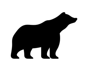Black silhouette of a large bear standing on all fours with pride