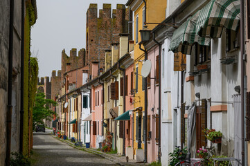 Fototapeta premium Colourful houses along the medieval city wall in Montagnana, Veneto, Italy