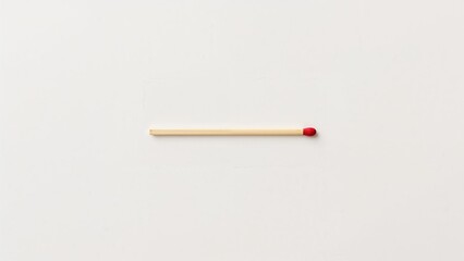 Two fresh matchsticks resting on an empty plane for text overlay