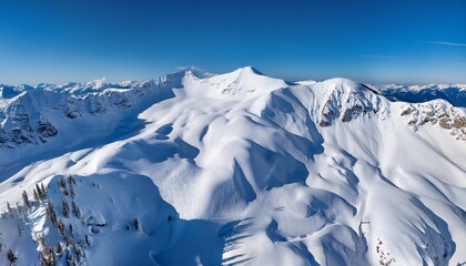 aerial view of snowy mountain slope texture of snow surface from above