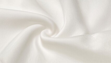 Obraz premium Tight frame on white cotton textile, focusing on its tender surface and soft folds bathed in warm, natural light to evoke a peaceful, natural sensation.