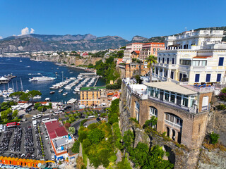 Fototapeta premium Sorrento. Amalfi coast. Italy. Drone view of Sorrento. View from above. Buildings and landmarks of Sorrento. Boats and yachts. Port of Sorrento. High-resolution photos.