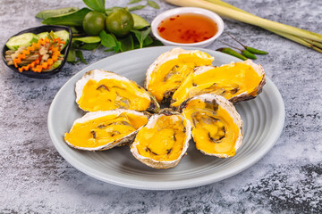 Baked oyster with cheddar cheese