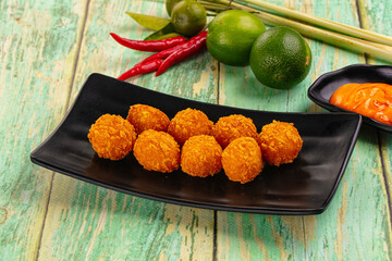 Fried crispy yellow cheese balls