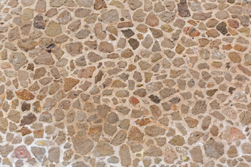 Rough Stone With Mortar Support Wall in Monaco Texture Pattern Background