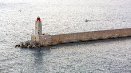 Red Light Stone Lighthouse at Entrance to Port of Nice France