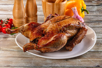 Baked with spices whole duck