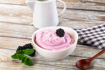 Organic tasty dairy yoghurt with blackberry