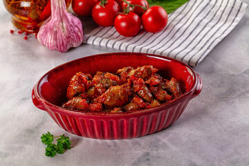 Roasted chicken hearts with vegetables