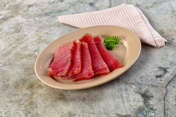 Raw red tuna sashimi slices