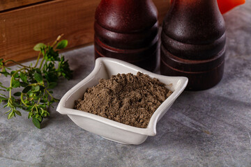 Ground dry black pepper powder