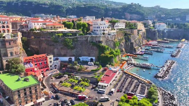 Sorrento. Amalfi coast. Italy. Drone view of Sorrento. View from above. Buildings and landmarks of Sorrento. Boats and yachts. Port of Sorrento. High-resolution video. Suitable for postcards, picture