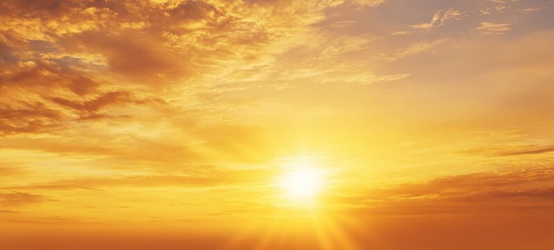 The breathtaking sunset illuminating the sky with vibrant golden hues - Powered by Adobe