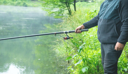 Fisherman catches fish. Fishing. Hobby