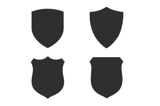 Set of 4 protective shields. Knightly military shield insignia of different shapes. Vector element for security logo, emblem, icon. Flat black silhouette collection.