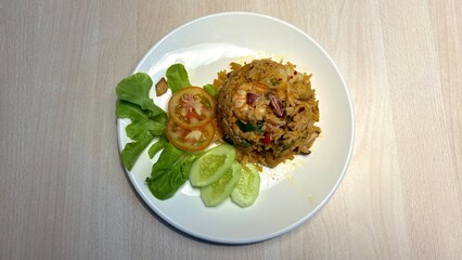 Fired rice spicy thai food style in the white plate.