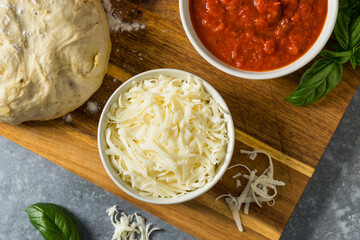 Homemade Shredded Mozzarella Cheese in a Bowl