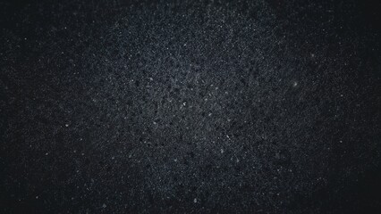 Close-up capture of a surface texture with irregular speckled details