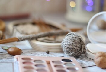 Needlework knitting objects on the table needles and clew ball wool yarn differen woman things...