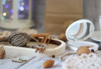 Needlework knitting objects on the table needles and clew ball wool yarn differen woman things...