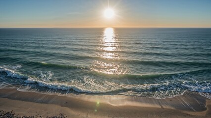 Fototapeta premium Bird's-eye perspective of coastline with waves breaking on the shore