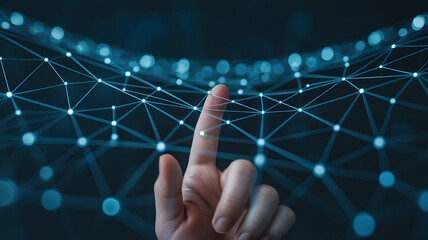 Close up of a human finger touching a glowing blue digital network interface with interconnected nodes and lines