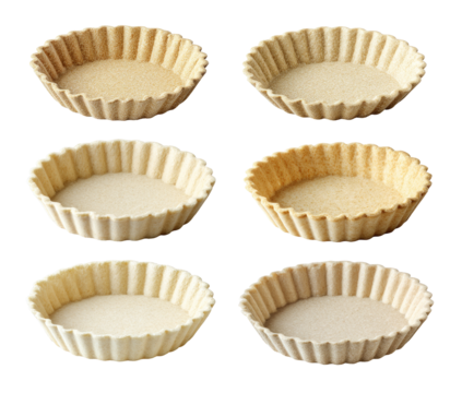 Six round, fluted tart shells in varying shades of beige