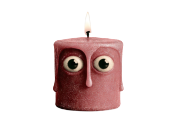Vintage melting candle with eyes creating a unique decorative piece