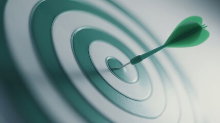 The dart hits the center of the target symbolizing achievement and focus.