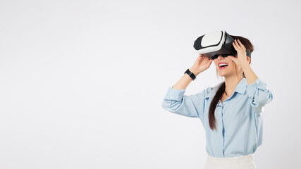 Young asian woman using virtual reality headset for vr game tech, teenage future is here,...