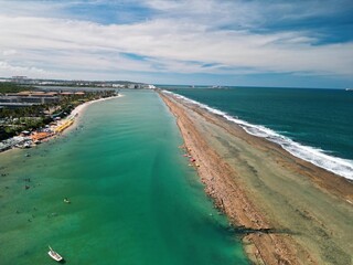 Aerial view of paradisiacal beach with crystal clear water – Muro Alto, Pernambuco, Brazil