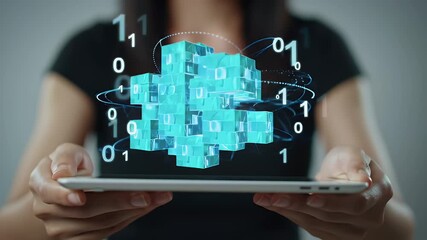 Woman Holding Tablet Displaying Turquoise Data Cubes with Binary Code Overlayed on Gray Background in a Studio Setting - Powered by Adobe