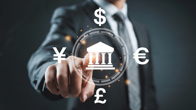 Businessman confidently interacts with global currency symbols and bank icon, symbolizing financial success and investment opportunities in a modern digital world.