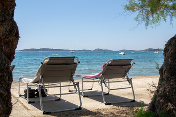 Two Beach Chairs Overlooking the Sea