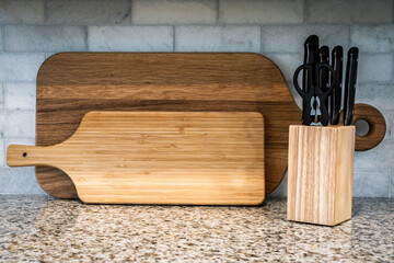 Kitchen Countertop with Wooden Cutting Boards and Knife Block