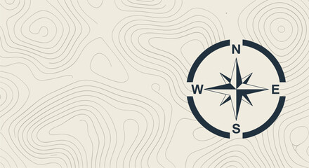 Navigational compass overlayed on contour map lines for outdoor adventure and exploration