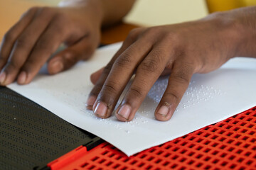 Visually impaired students writs using the Braille system