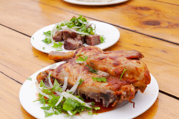 Plate of chicken with a side of vegetables