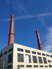 Large building with two tall chimneys