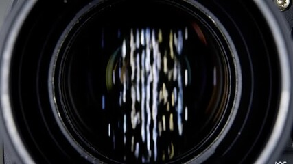 Lens view shows blurry, vertical white light streaks - Powered by Adobe