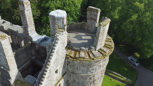 slow arial drone footage of scottish huntly castle ruin epic dramatic views closeup abandoned building tourist attraction no people